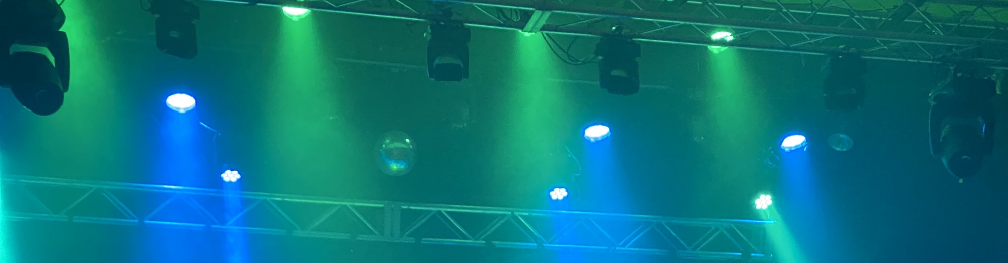 blue and green theater stage lights Ames